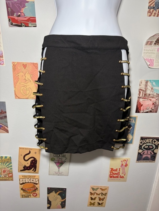 AKIRA Dresses & Skirts - AKIRA Black Mini Skirt with Gold Side Lace-Up